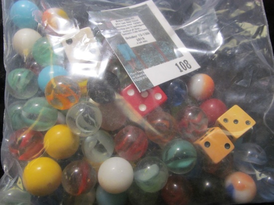 Group of marbles and dice