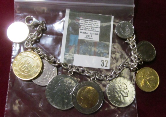Heavy link sterling 8" charm bracelet with 9 different Italian coins, bracelet is marked 925, 59 gra