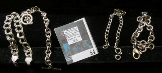 4 different style 7" silver charm bracelets, heavy group, 64 grams, each is marked either 925 or STE