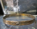 Sterling hand tooled bangle style bracelet, with stylized pine cones and pine needles, signed UNE ST