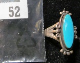 Sterling and turquoise Native American ring with a stylized bell signature, marked STERLING, size 7,