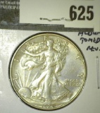 1938 Walking Liberty Half Dollar, AU, album toned reverse, value $45