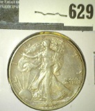 1940 Walking Liberty Half Dollar, AU toned, value $22