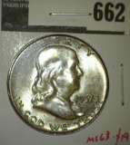 1957 Franklin Half Dollar, BU toned, MS63 value $19, MS65 value $40