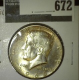 1966 Kennedy Half Dollar, BU toned, MS65 value $25