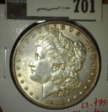 1883 Morgan Dollar, BU, value MS63 $75, MS65 $200