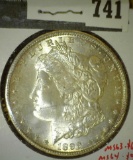 1899-O Morgan Dollar, BU, value MS63 $65, MS64 $90, MS65 $190