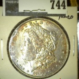 1900-O Morgan Dollar, BU toned, value $70