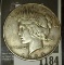 1934 D U.S. Peace Silver Dollar.