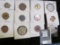 (12) Foreign Coins, some grading BU, some Silver. Includes a 1947 India Tiger Coin.