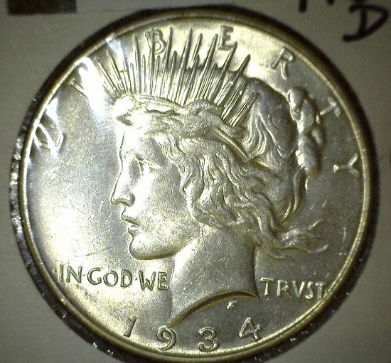 1934 D U.S. Peace Silver Dollar. A very nice high grade.