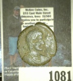 Ancient Roman Bronze Coin depicting an Emperor on one side and a King with crown kneeling to a soldi
