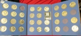 Partial Set of Kennedy Half Dolllars in a blue Whitman folder. Includes 1964 P & D 90% Silver, 1966,