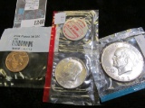 1999 D Gold-plated Delaware Statehood Quarter; 1968 D Silver Kennedy Half Dollar; & 1973 P BU Eisenh