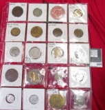 Plastic page with 20 various Foreign Coins, Tokens, Medals, Mint errors, and etc.