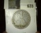 1876 P U.S. Seated Liberty Half Dollar.