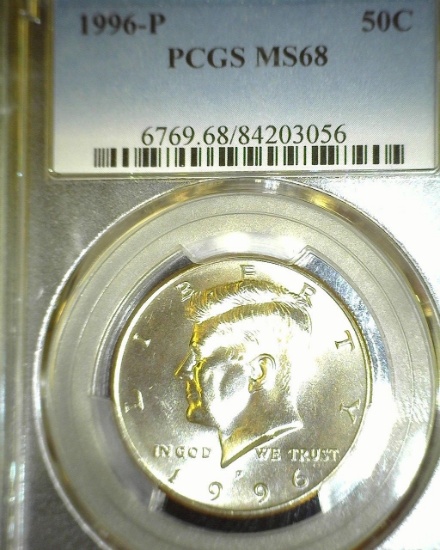 1996 P Kennedy Half Dollar slabbed "PCGS MS68".