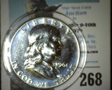1961 P Proof Benjamin Franklin Silver Half-dollar, encapsulated in a removable airtight Cointain.