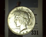 1925 P U.S. Peace Silver Dollar, Brilliant Uncirculated.