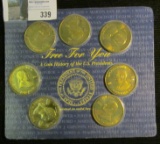 Set of (7) Presidential Medals in a holder.