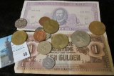 A couple pieces of old Foreign Currency dating back to World War II and a group of Irish and Great B