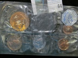 1961 Five-piece U.S. Proof Set, coins are loose with original cellophane. Lots of toning.