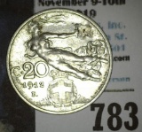 1912R Italy 20 Centesimi, depicts a nude woman flying in the clouds.