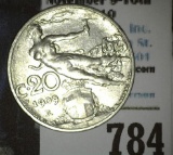 1909R Italy 20 Centesimi, depicts a nude woman flying in the clouds.
