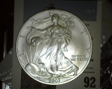 2003 U.S. Silver American Eagle One Dollar .999 Fine Silver Coin. Gem BU with Littleton Coin Co. cel