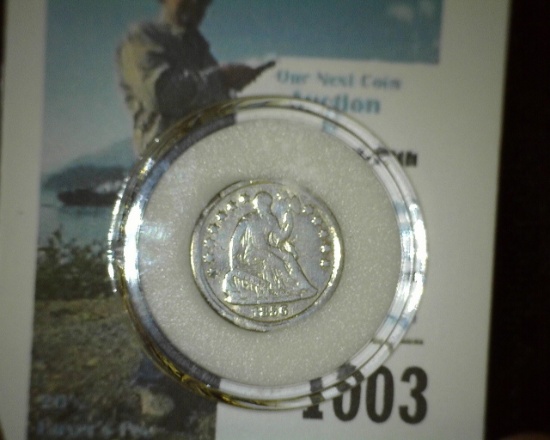 1856 U.S. Seated Liberty Half Dime mounted in an airtight holder.