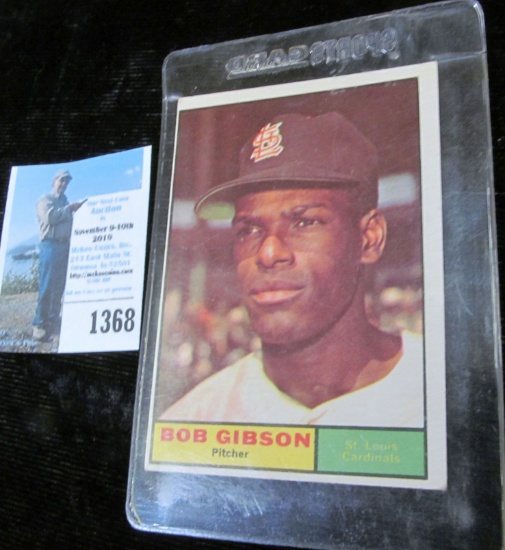 1961 Topps # 211 Bob Gibson Baseball Card in a hard plastic case. Never been graded.