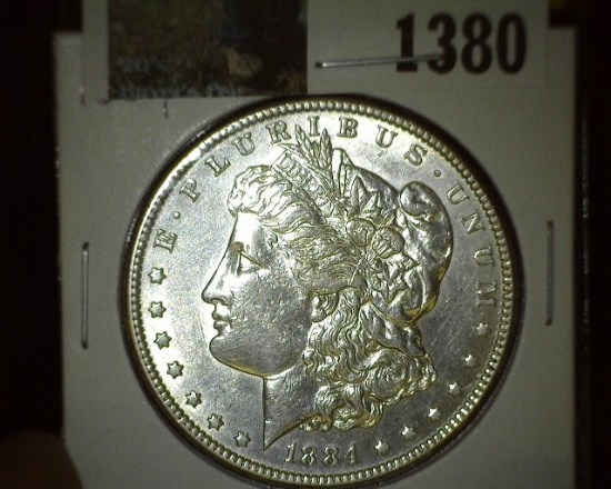 1884 P Morgan Silver Dollar.