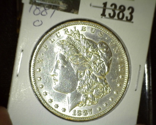 1887 O Morgan Silver Dollar.