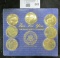 (7) Solid Brass BU U.S. Prsidents Coins in holder.