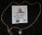 14K Gold Chain with 10K Gold Pendant containing a Diamond and Pearl.