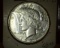 1934 D U.S. Peace Silver Dollar with a lot of shine.