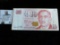 Ten Dollar Singapore Banknote with security devices.