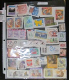 (43) Old Foreign Stamps in a plastic page.