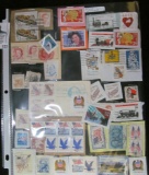 (53) old U.S. Stamps in a plastic page.