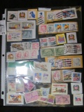 (53) old U.S. Stamps in a plastic page.