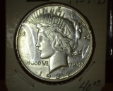 1934 D U.S. Peace Silver Dollar with a lot of shine.