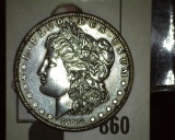 1889 P Morgan Silver Dollar, a nice high grade.