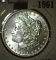 1899 O U.S. Silver Morgan Dollar, note on coin was that it was at one certified MS 65. Decide for yo