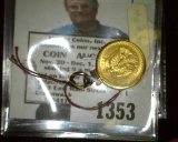 Mexico 2 1/2 Peso Gold Piece, Brilliant Uncirculated in a gold bezel and ready to be suspended from
