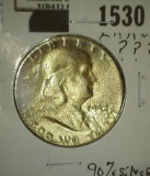 1952 S or D Franklin Half Dollar with a very wavy planchet.