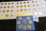 Littleton Coin Co. green folder containing 39 different U.S. Presidential One Dollar Coins, all Gem