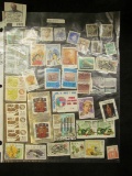 (44) Miscellaneous Foreign Stamps in a plastic page.