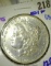 1878 P Morgan dollar with 8 tail feathers