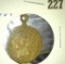 1837 British token/ pendant with queen Victoria on the front.  On the reverse it says 