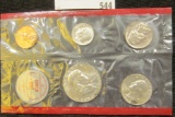 1963 Denver U.S. Silver Mint Set in original red trimmed cellophane as issued by the U.S. Mint.